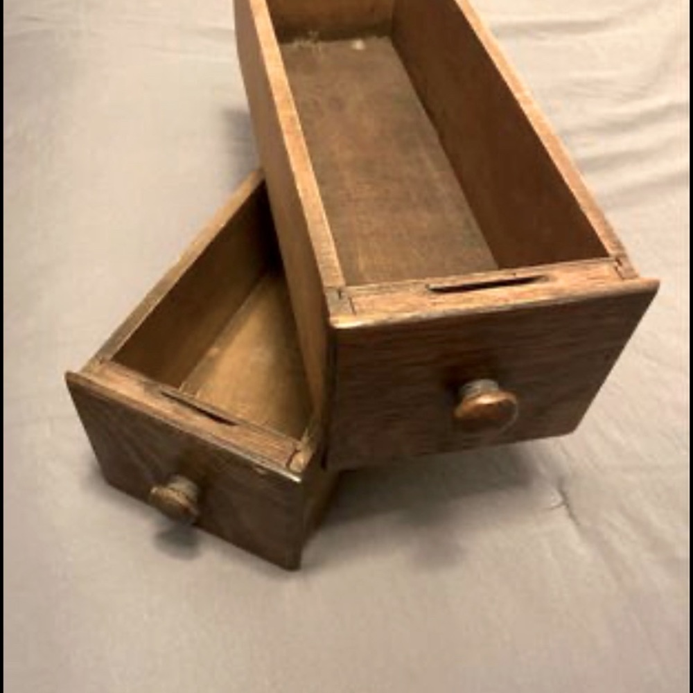 Vintage sewing machine drawers.